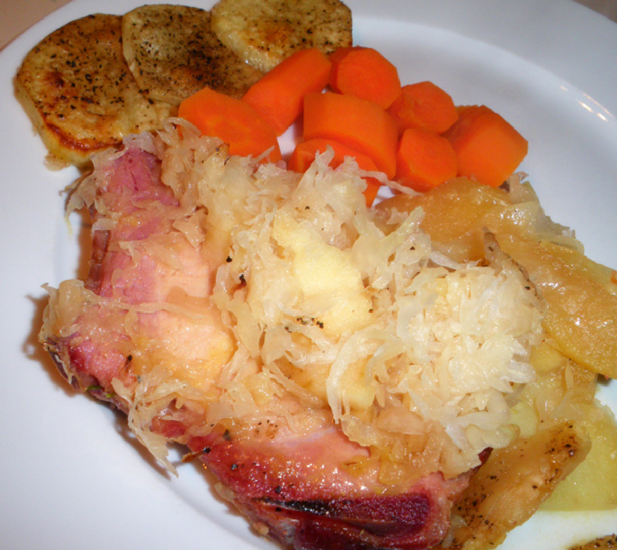 Smoked Pork Chop With Sauerkraut, Potatoes & Applesauce recipe